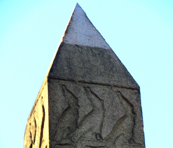 A stone tower with a sky background