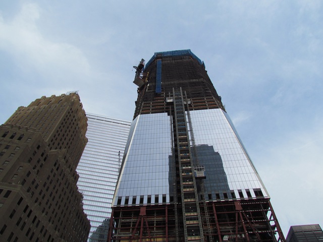 A building under construction with scaffolding around it.