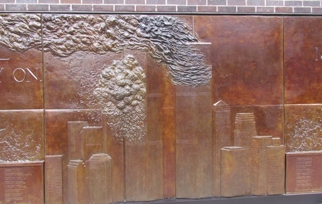 A wall with some type of artwork on it